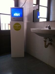 Loop festival video art in the men's toilet at Centre Civic Pati Llimona in Barcelona.